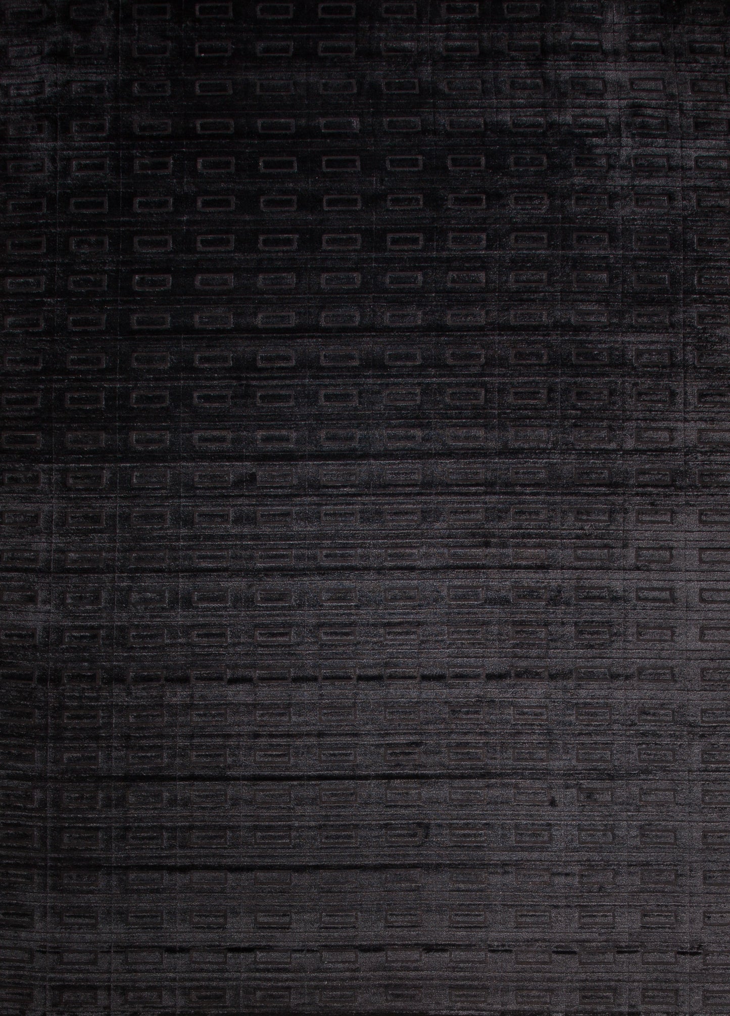 Modern black carpet comes with a brick pattern, and its contemporary design is geometrical, organized, and great for any office or reception area.