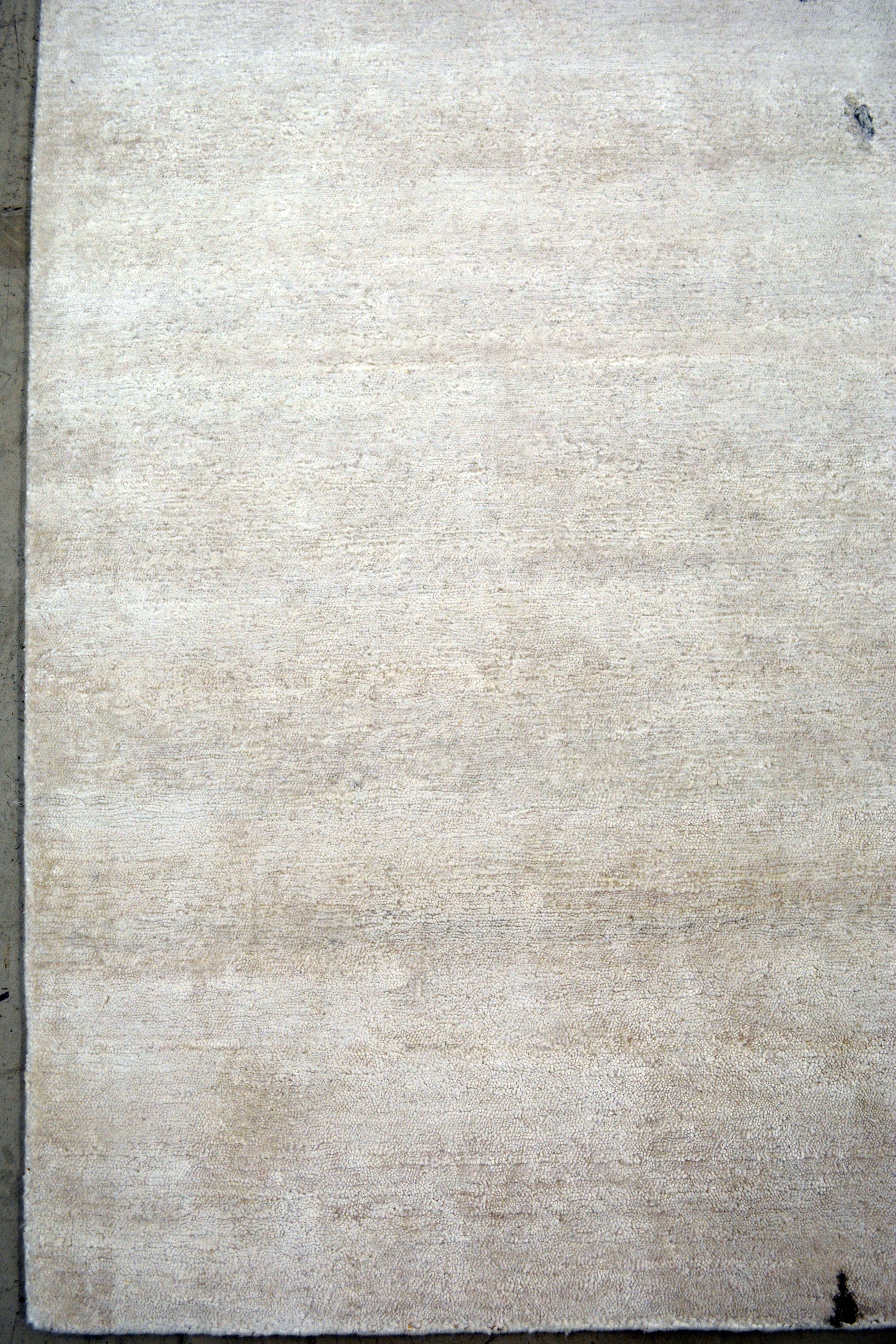 On the bottom left corner there is the white plain background.