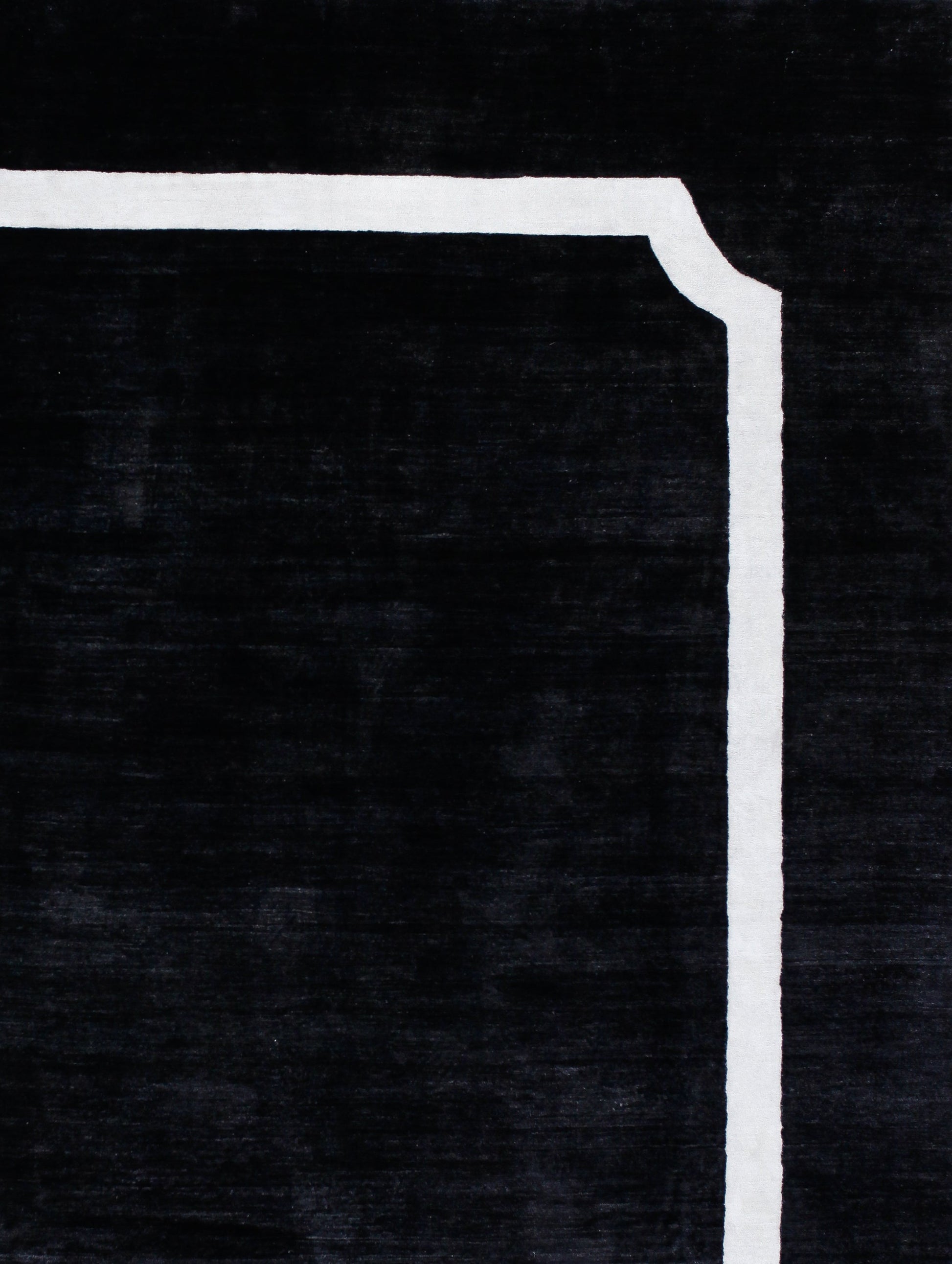 On the top right corner, there is a white solid frame with an inverse rounded corner.