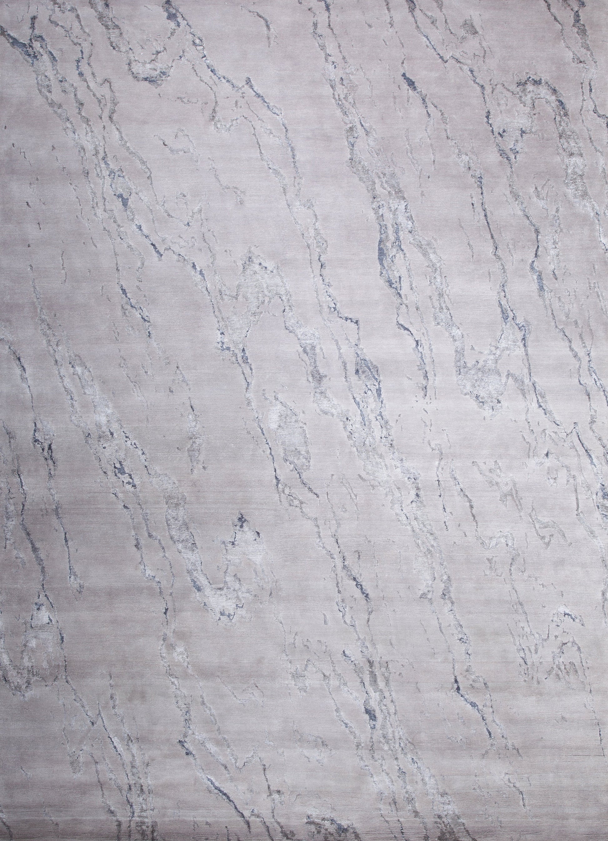Contemporary rug with a fresh look jeans pattern. The dominant color is light gray with blue accents on top.