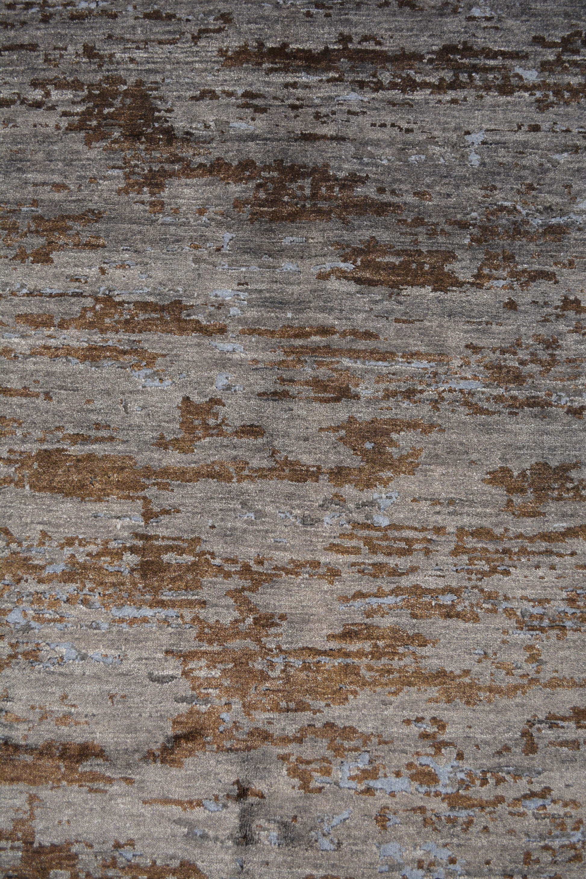 On the top right corner, the worn out design is well distributed over the whole rug.