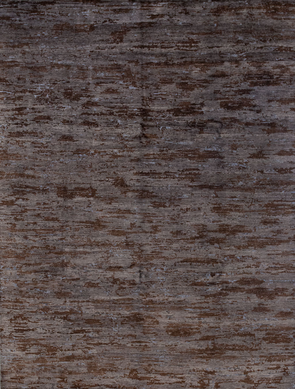 Contemporary carpet comes with a late baroque style. The color scheme oscillates among gray towards brown.