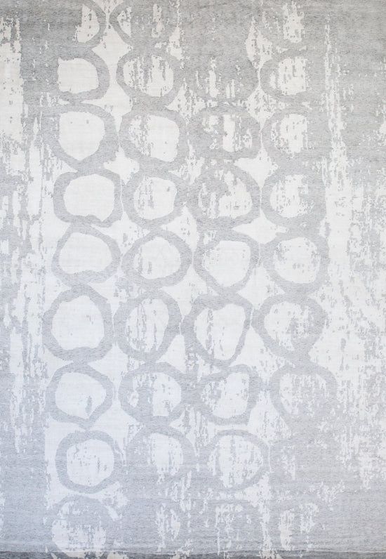 White rug with light gray circles.