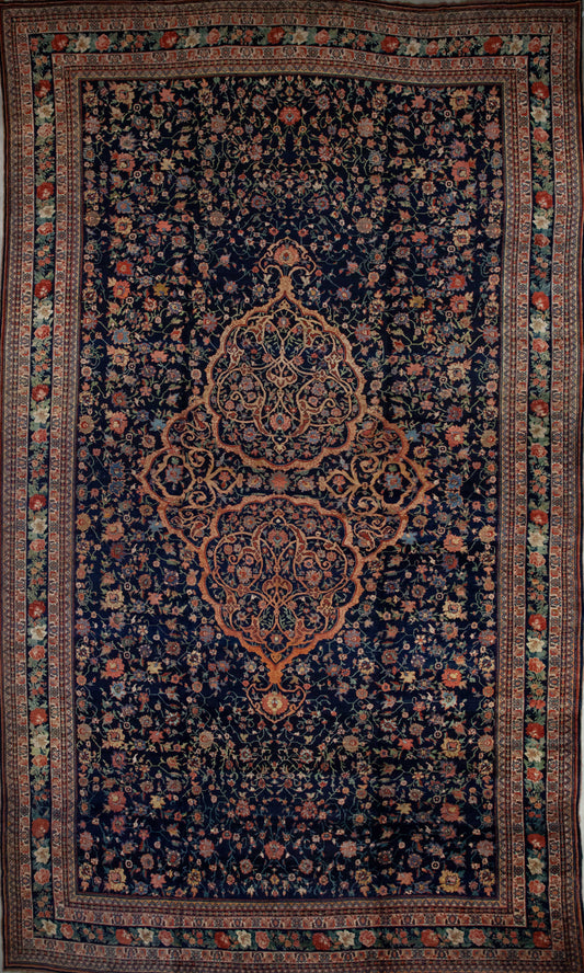Monumental rug comes with the traditional multiple borders and frames from the antique style. The color palette has red, green, yellow, white, and blue as the dominant tone. 