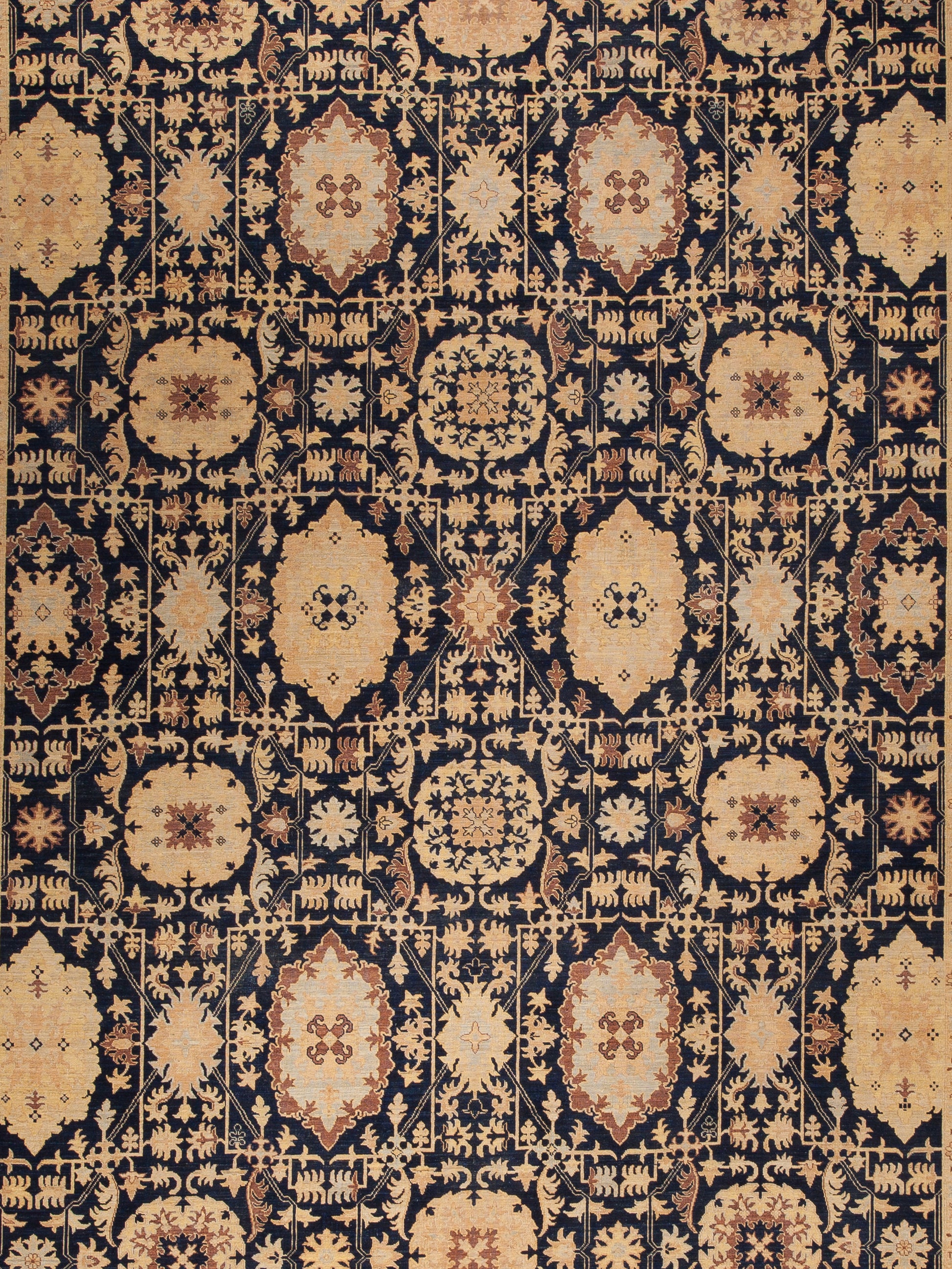 Finally, abstract leaves, swords, pine trees and more flaming shapes are featured in the center of the rug in a crowded pattern and all arranged symmetrically. 