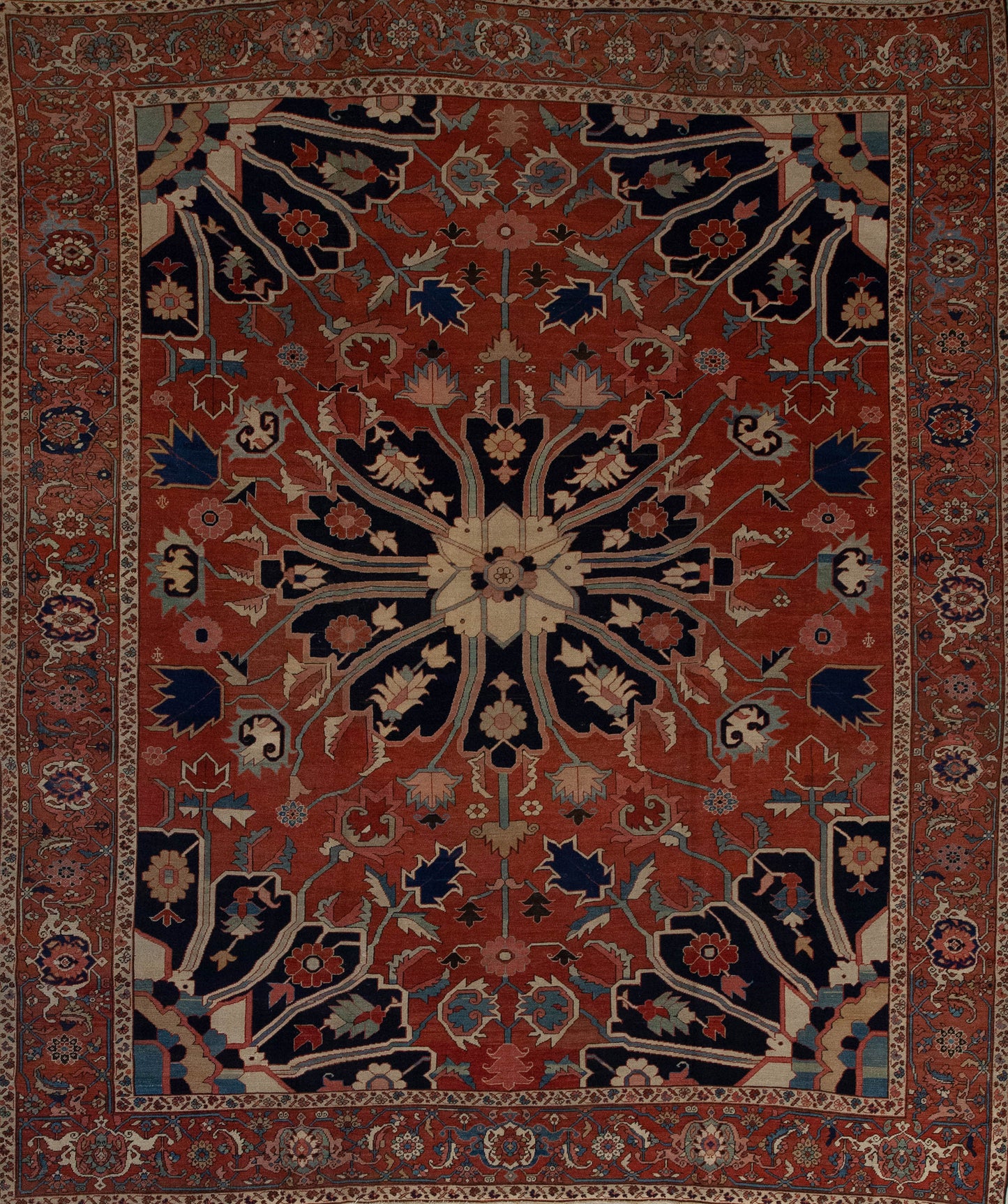 This ancient carpet comes with an adventurous orange vibe as the background. The color palette has black for the large petals of the largest flowers, and highlights of beige, blue, red, and brown. 