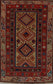 Ancient rug is knotted with orange, red, white, blue, red, beige, and yellow.