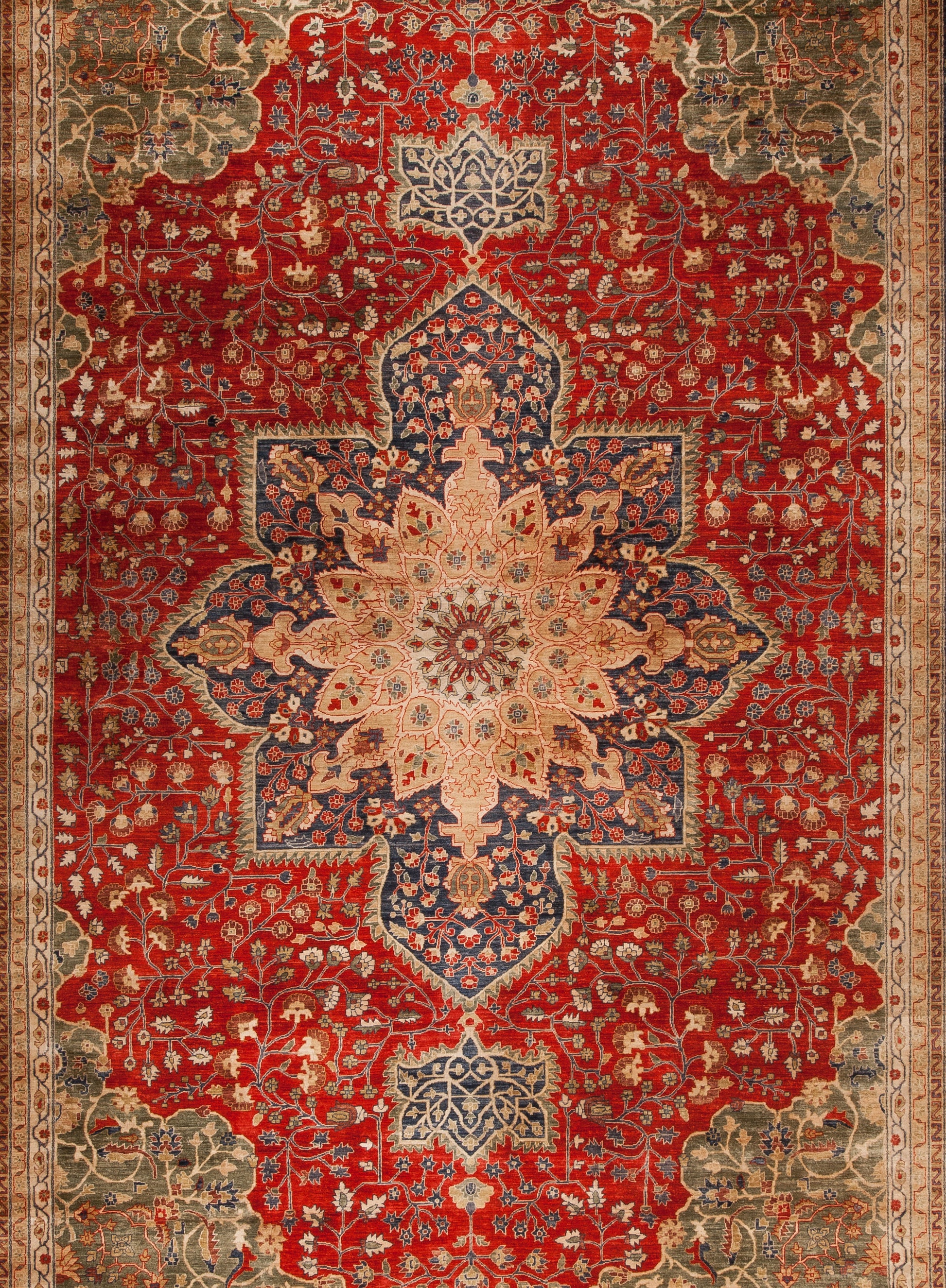 Finally, the center of the rug features a blue mandala that contains a yellow nested one.