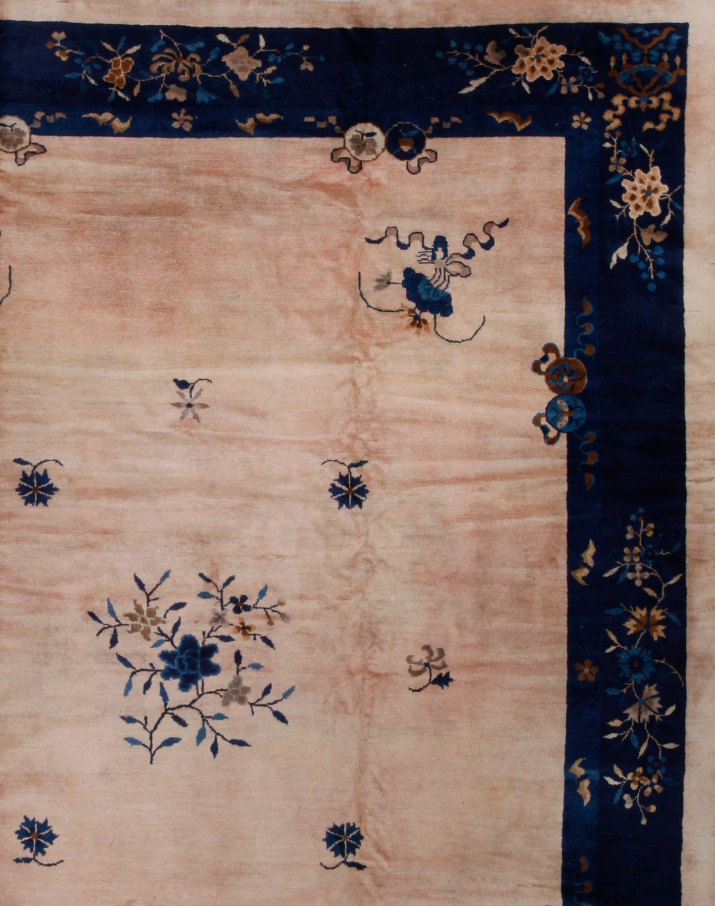 The top right corner shows this thick royal blue with some beige flowers.