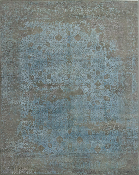 Classic rug with light blue background and a beautiful brown pattern.