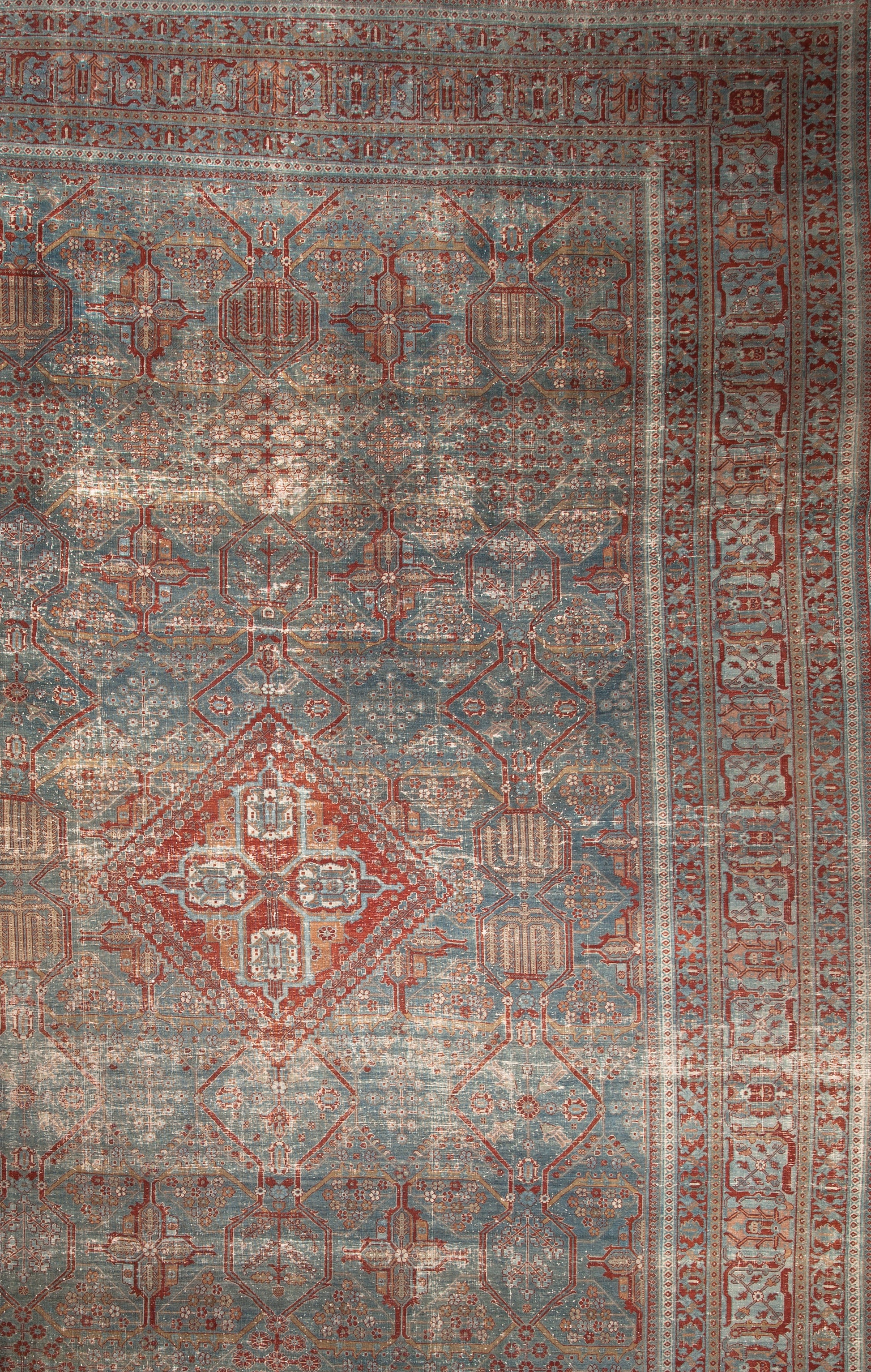 The top right corner has a thick frame full of detailed patterns in blue and red.