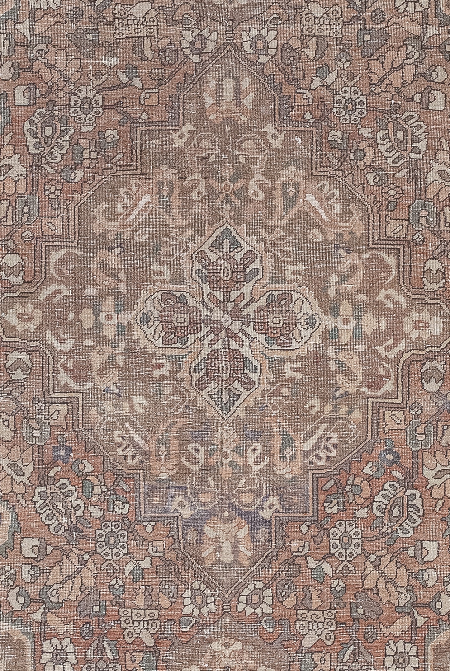 The center of the rug features a large diamond shape with many tribals around and within.