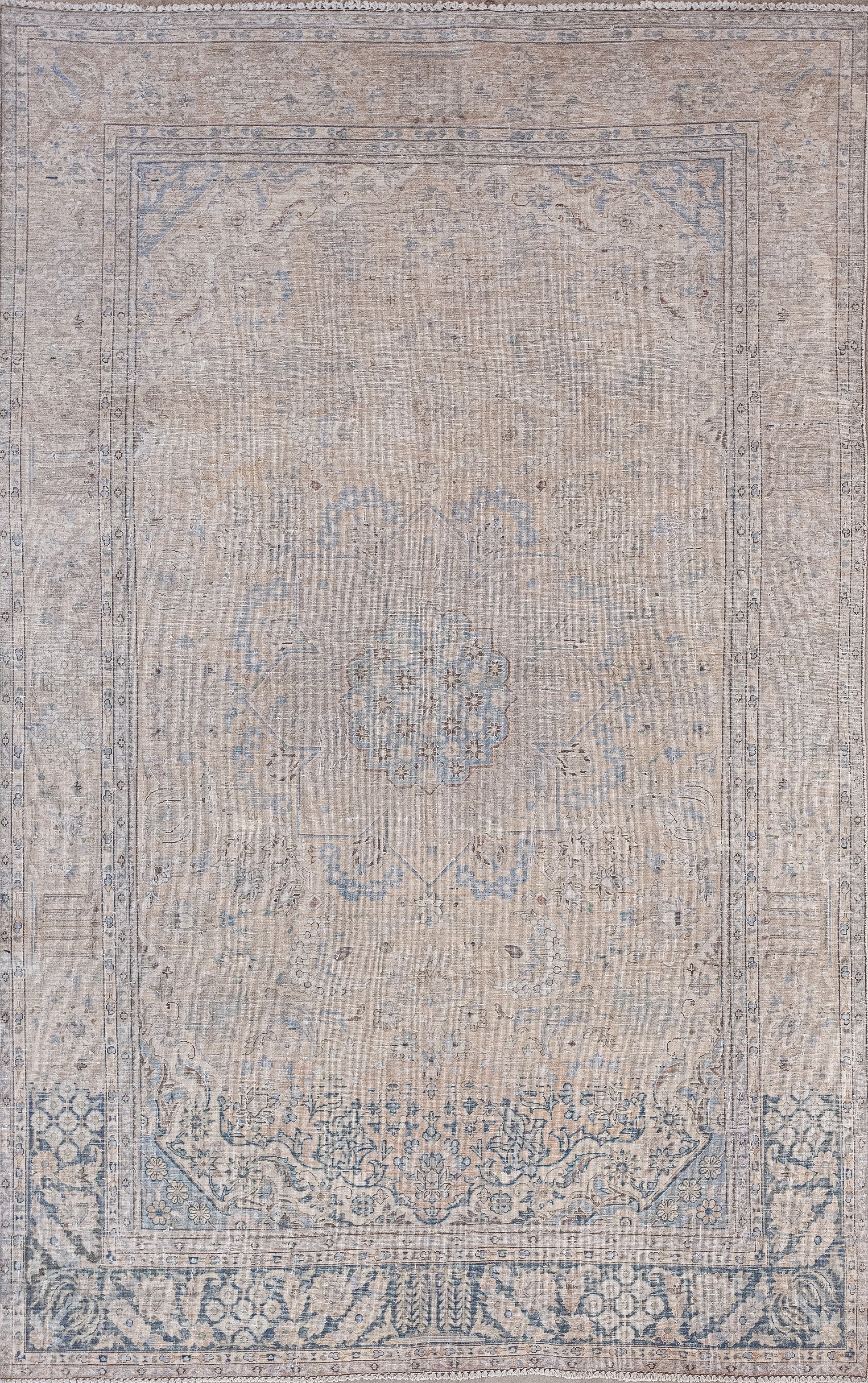 This jewel in the form of a rug was woven with the inspiration of one of the world's great religions, Buddhism. The illuminating color scheme has a latte for the background, cloud blue for the pattern, and black for the outlines.