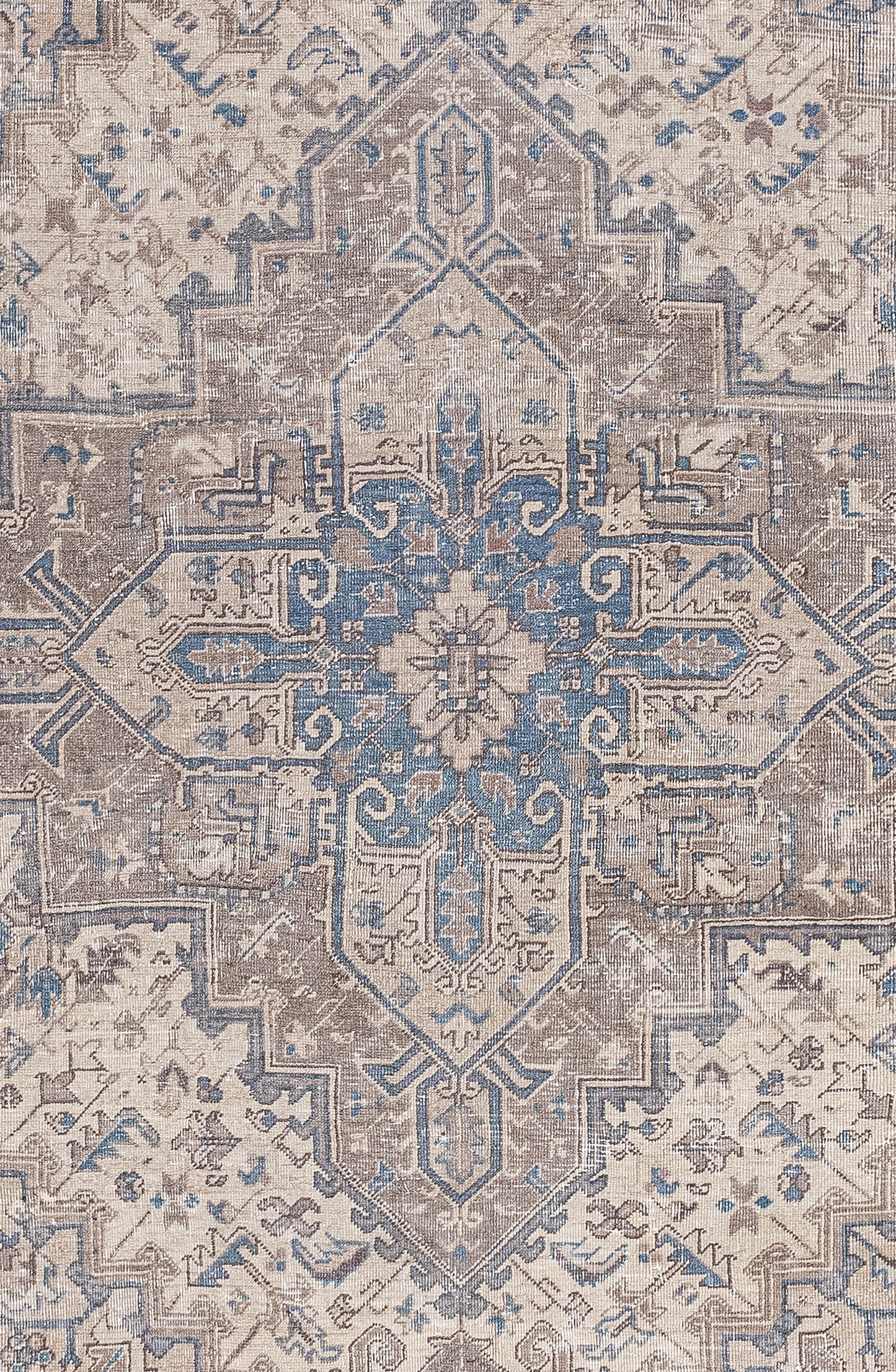  The center of the rug has a square cross that has nested others that have been filled with geometric shapes and symbols.
