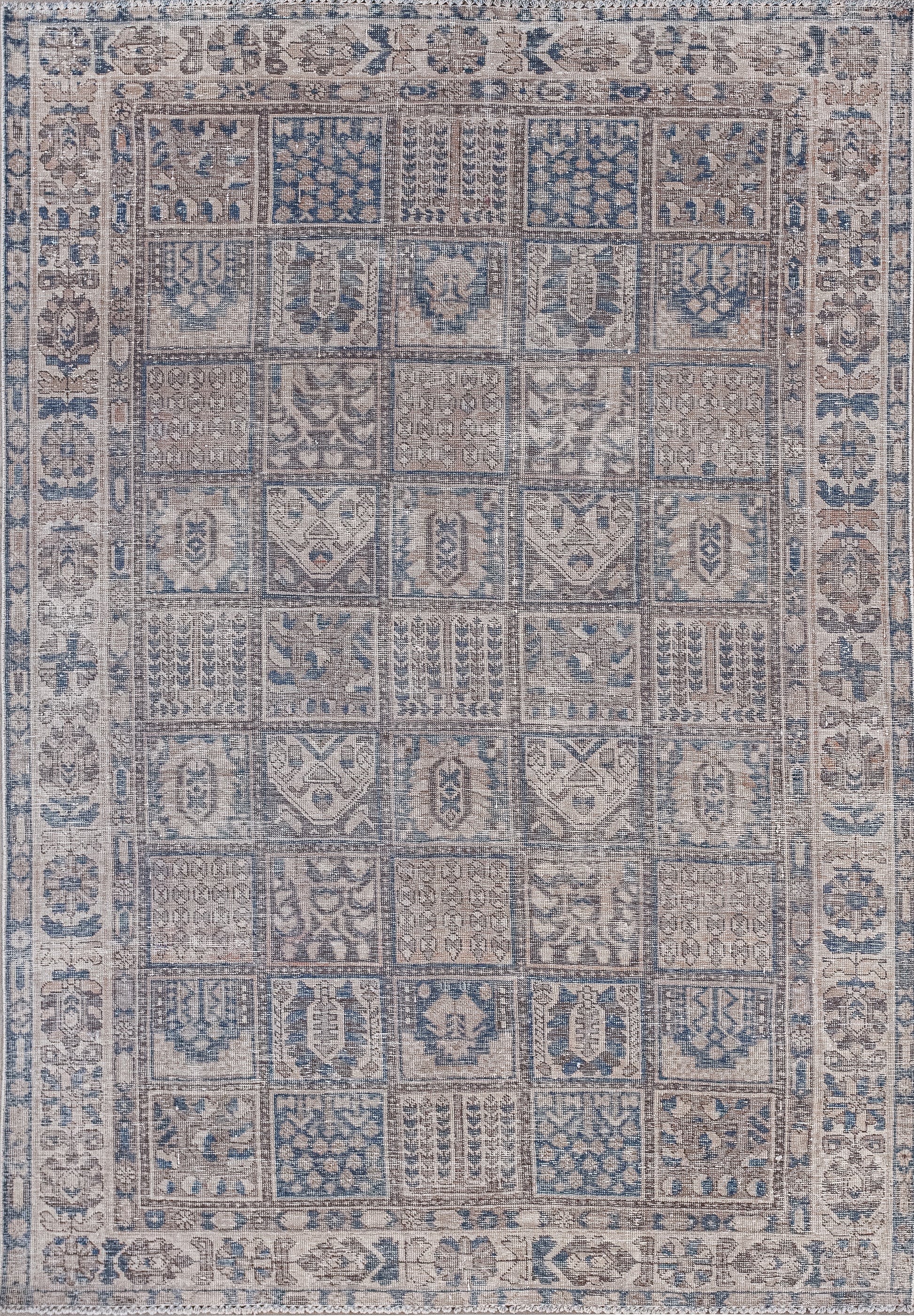 This interesting rug was woven from the tribal symbols of ancient communities. The vintage color scheme has gray, brown, and blue. 