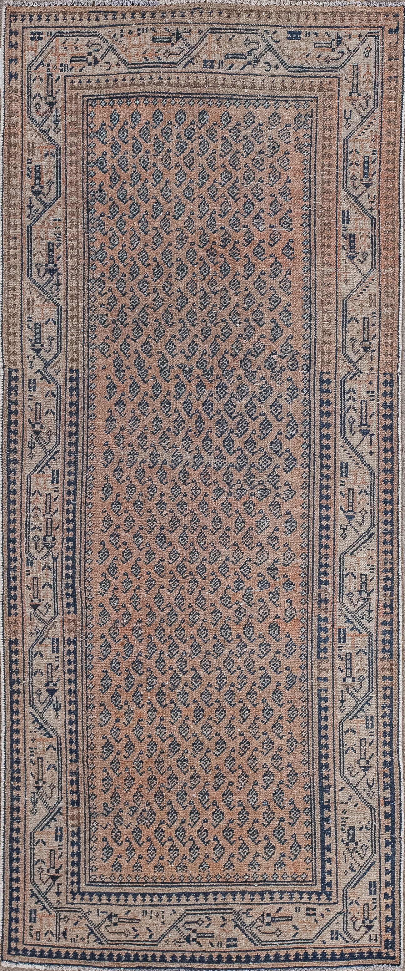 This comfortable rug comes in a handy size because you can use it for a workshop, a fishing shop, and/or a hallway. The warm color scheme has shades of copper, beige, brown and blue.
