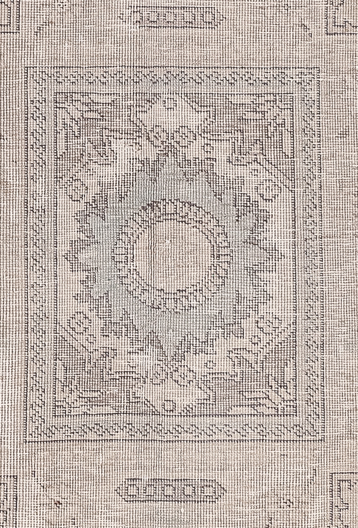 The close-up of the carpet shows a rectangle supporting a nested one and its center has mandalas with a circle as the focal area.