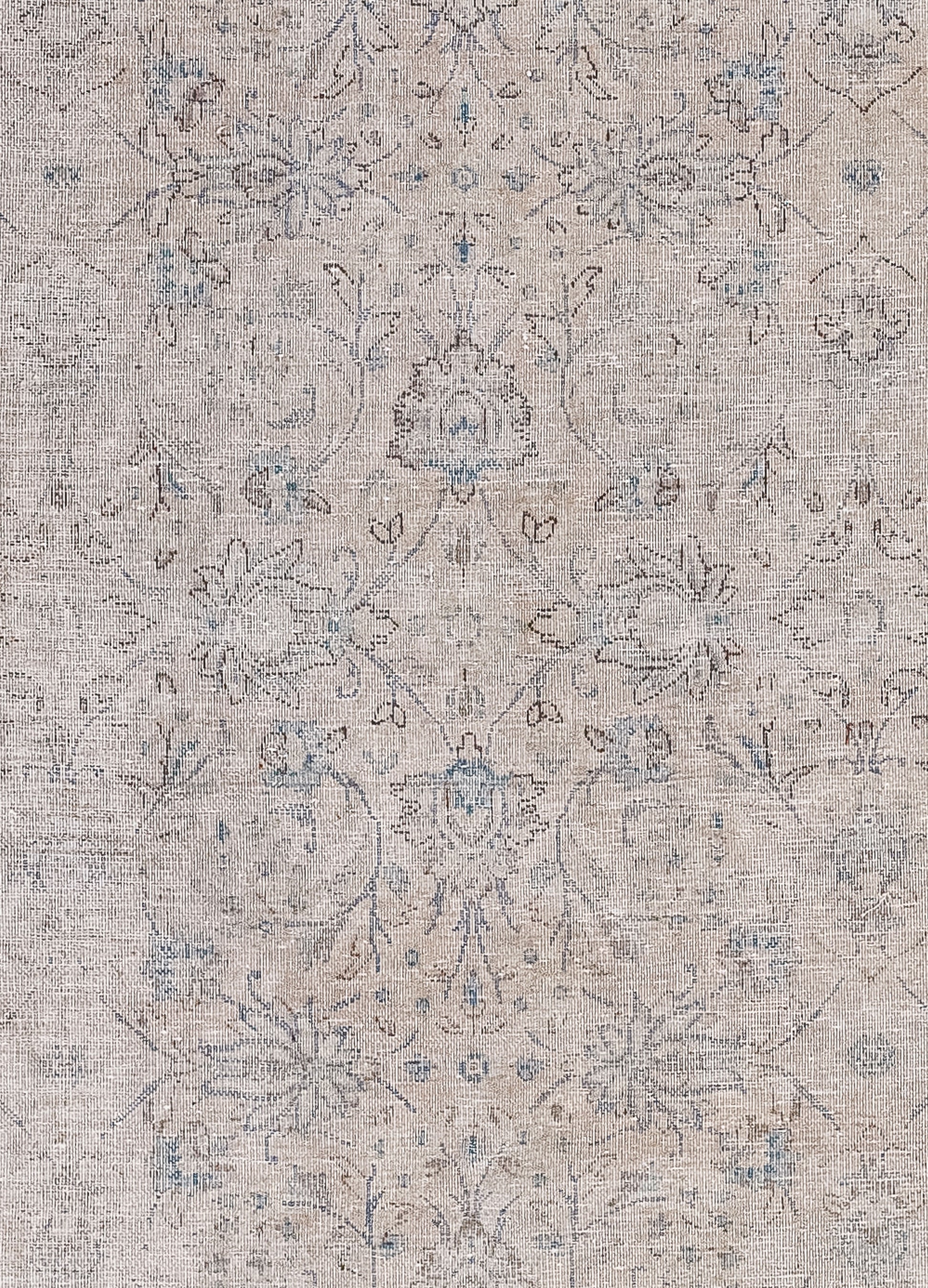 The rug has small fringes and the top and bottom. The center of the rug features a closer look at the details of the symmetrical carnation pattern.