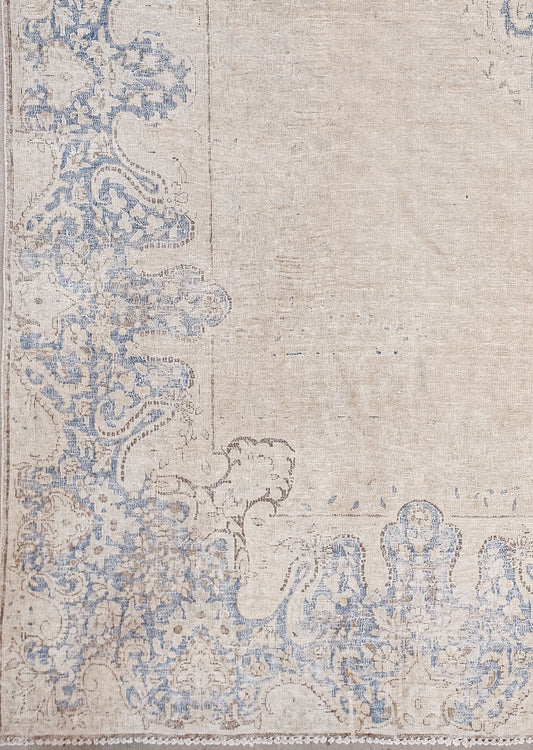 The color scheme has a linen tone for the background, blue for the margin and center pattern.
