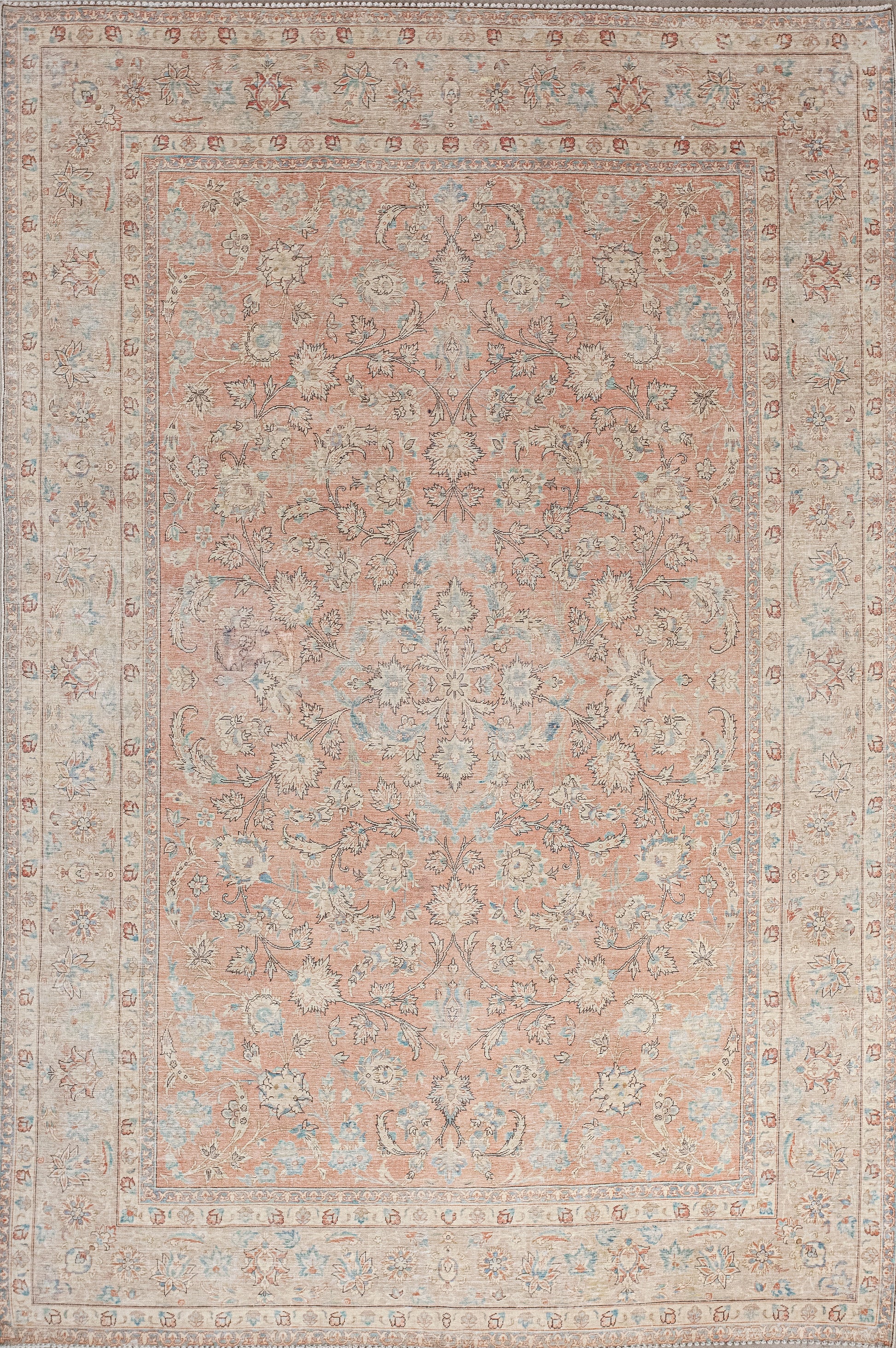 This captivating carpet is perfect for living room and dining room. The color palette comes in varieties of beige for the perimeter, blue for the highlights, and mostly a light-tangerine shade that is believed to aid digestion. 
