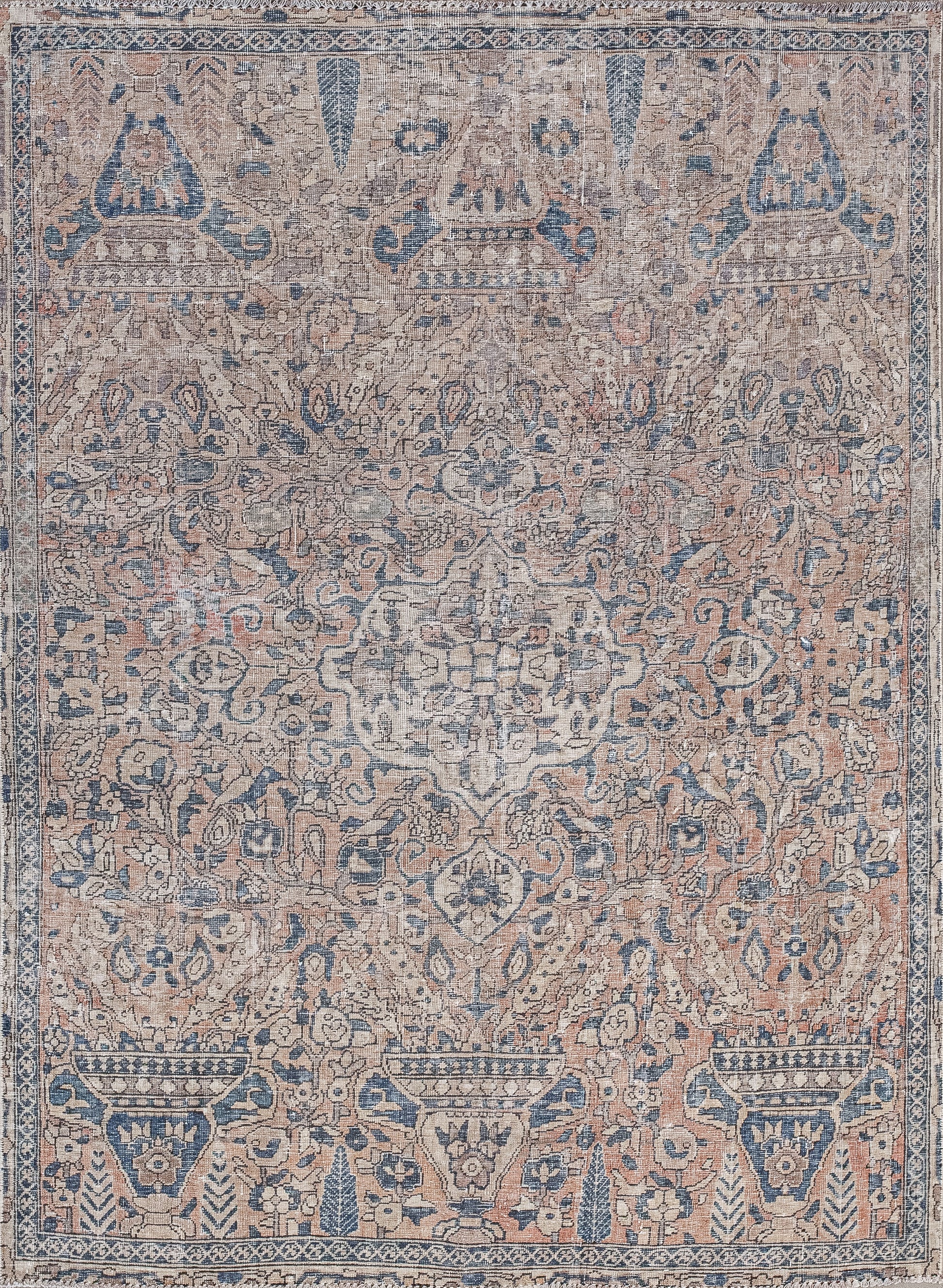 This gorgeous rug was woven down to earth, with serious colors signifying structure, stability, and support. The color palette has a brown background, variations of beige for the pattern, and blue.