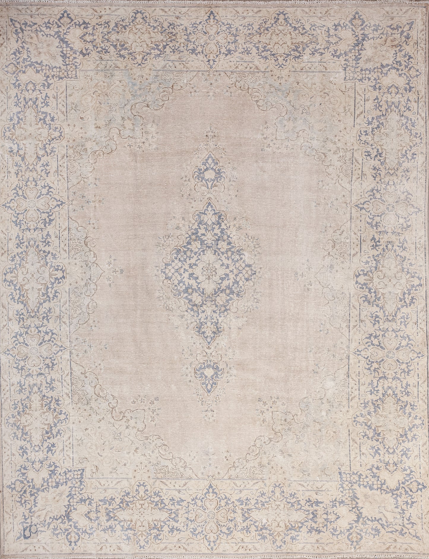 This natural rug comes with a simple design. The color palette has linen background, blue pattern, and brown outlines.