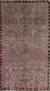 Ancient rug comes in distressed finish. The color scheme has black, gray, and pink. The pattern is a pink grid that creates fifteen squares, which contain fade-in pink crosses inside of each square.