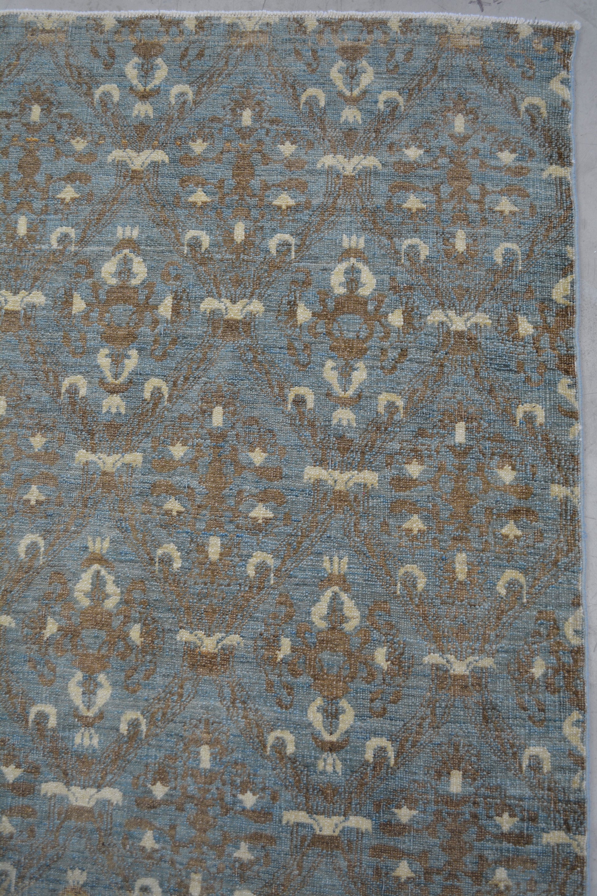 In the upper right corner, the pattern is evenly rendered across the entire rug. 