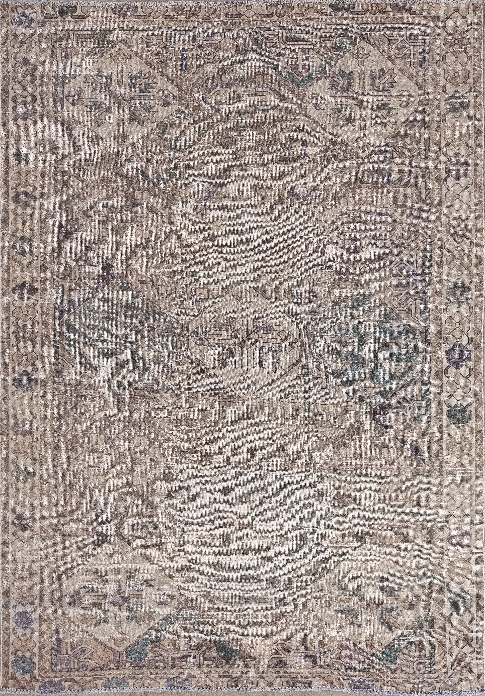Vintage rug comes with an interesting pattern in the center. The color scheme is within beige, brown, green, and purple with the circa trend finish.