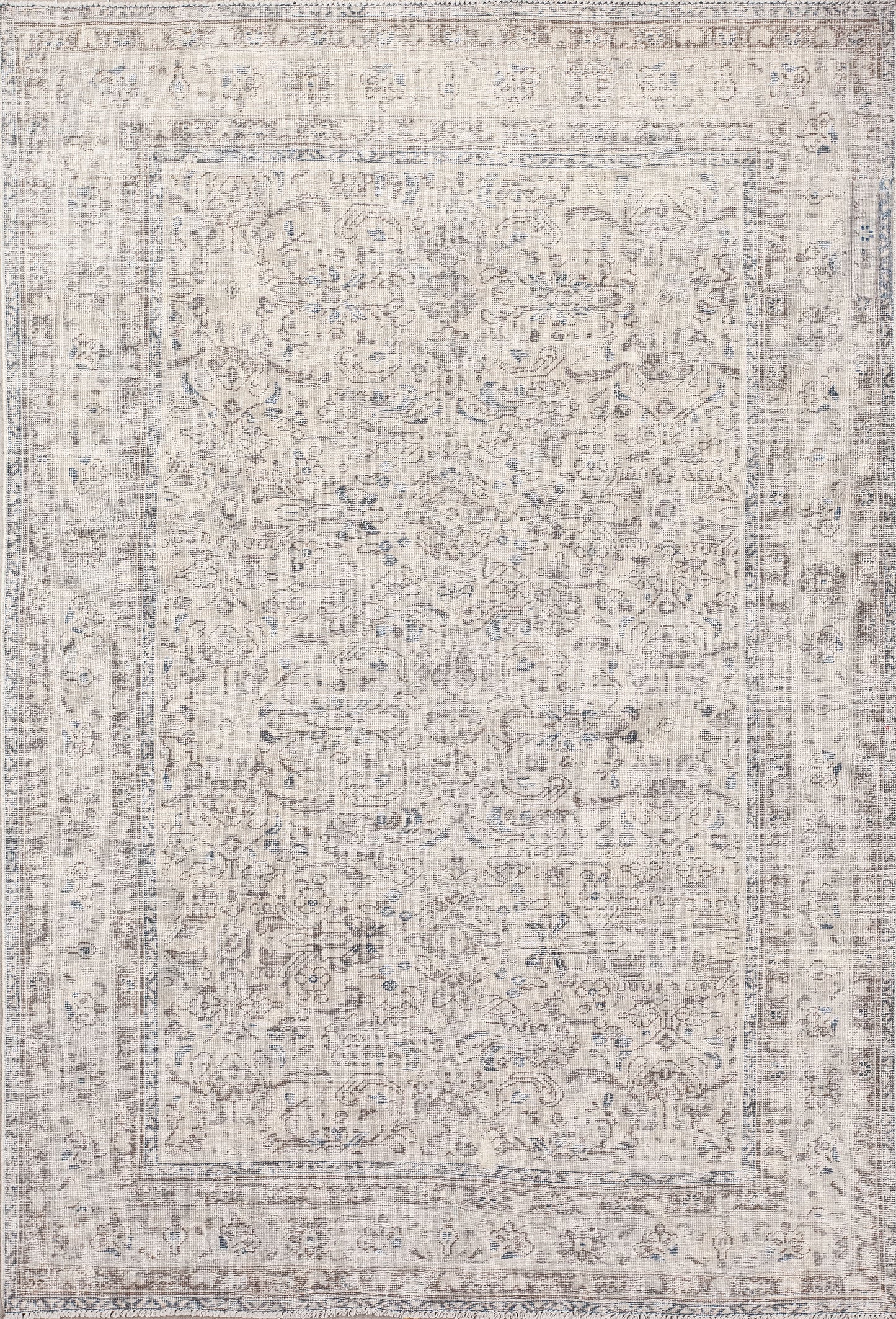 Vintage rug was woven with beige background and a floral pattern. Also, this elegant carpet comes with leaves and geometrical figures in blue and light brown.