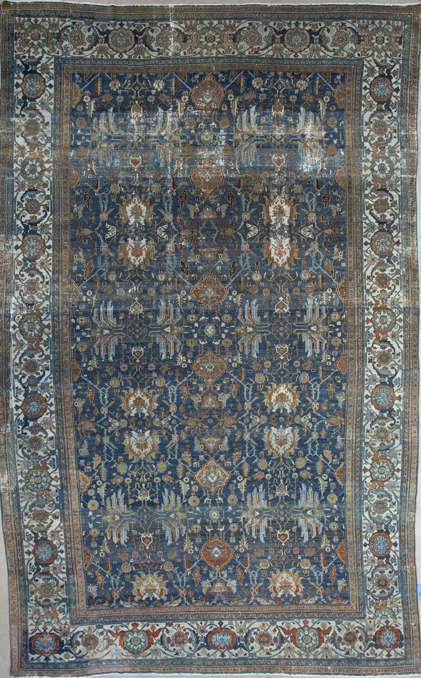 Grandiose Antique rug with an elegant color scheme in blue, white, brown, and gray.