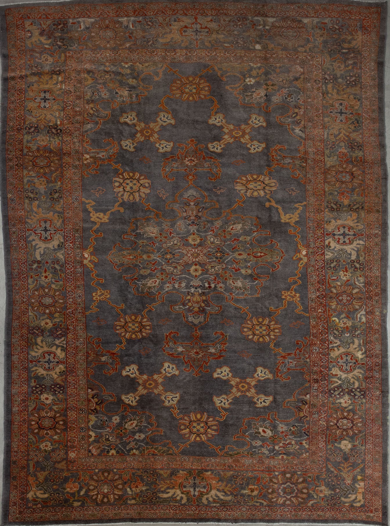 This ancestral rug knitted with dark gray background that comes with a convenient color scheme which is yellow, orange, white, and green.