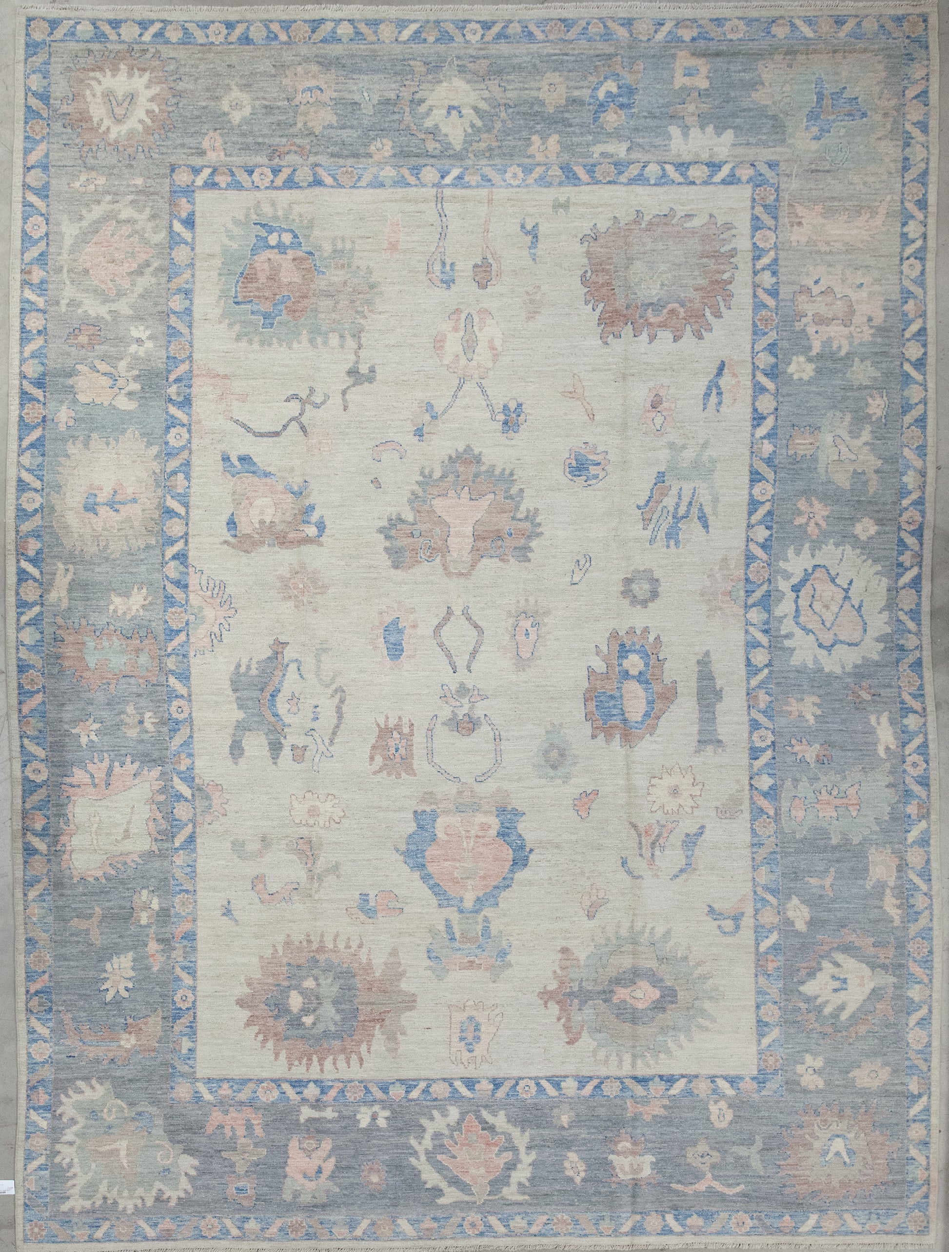 Classic carpet comes with a soft color scheme which is composed by gray, blue, beige, brown, and green. The design renders abstract flames, flowers, and branches. 