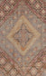 The center of the rug displays a large yellow rhomb with another one in the middle over gray background.