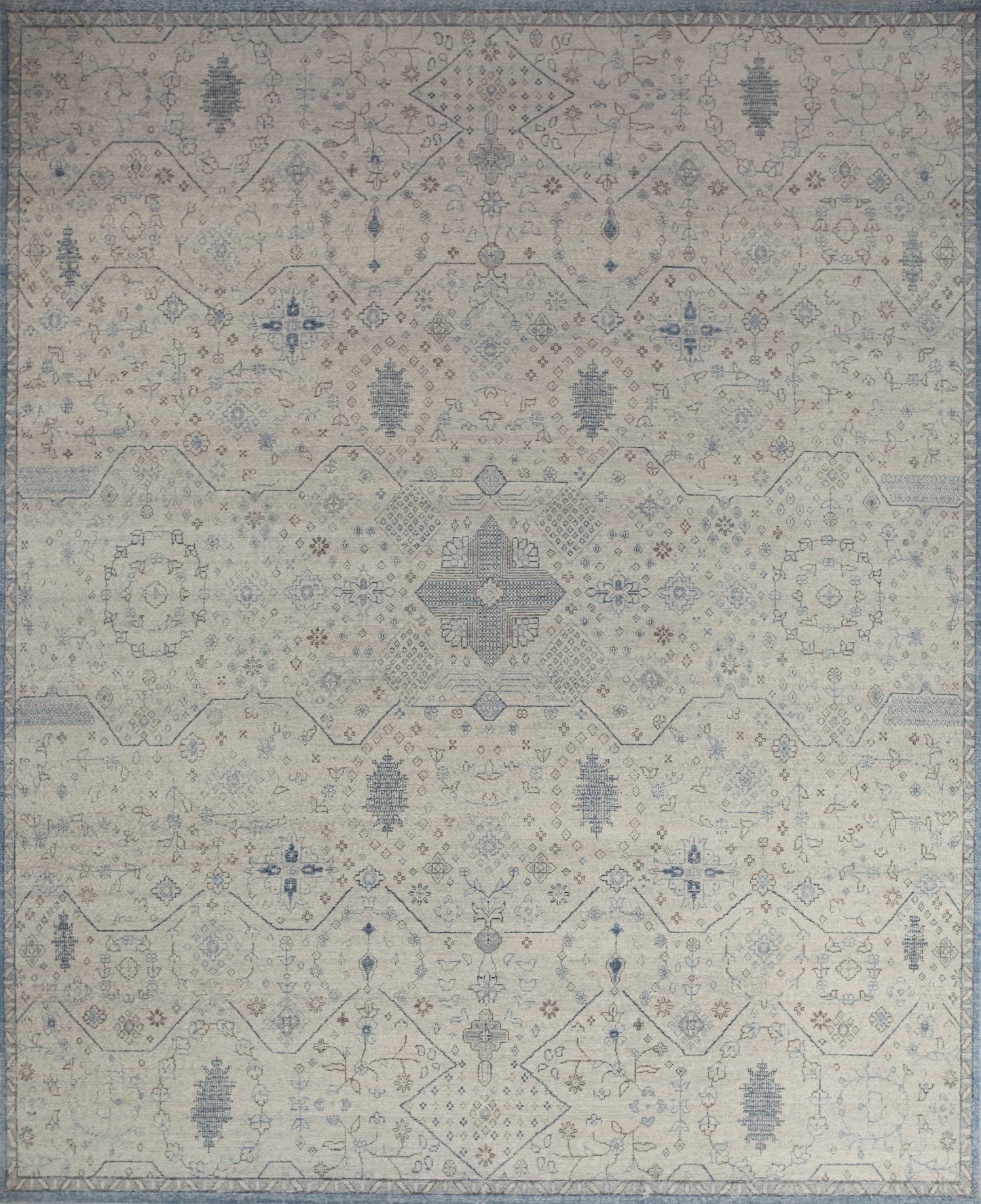 Flawless carpet comes with a relaxing color theme which has light blue, beige background, and brown details. 