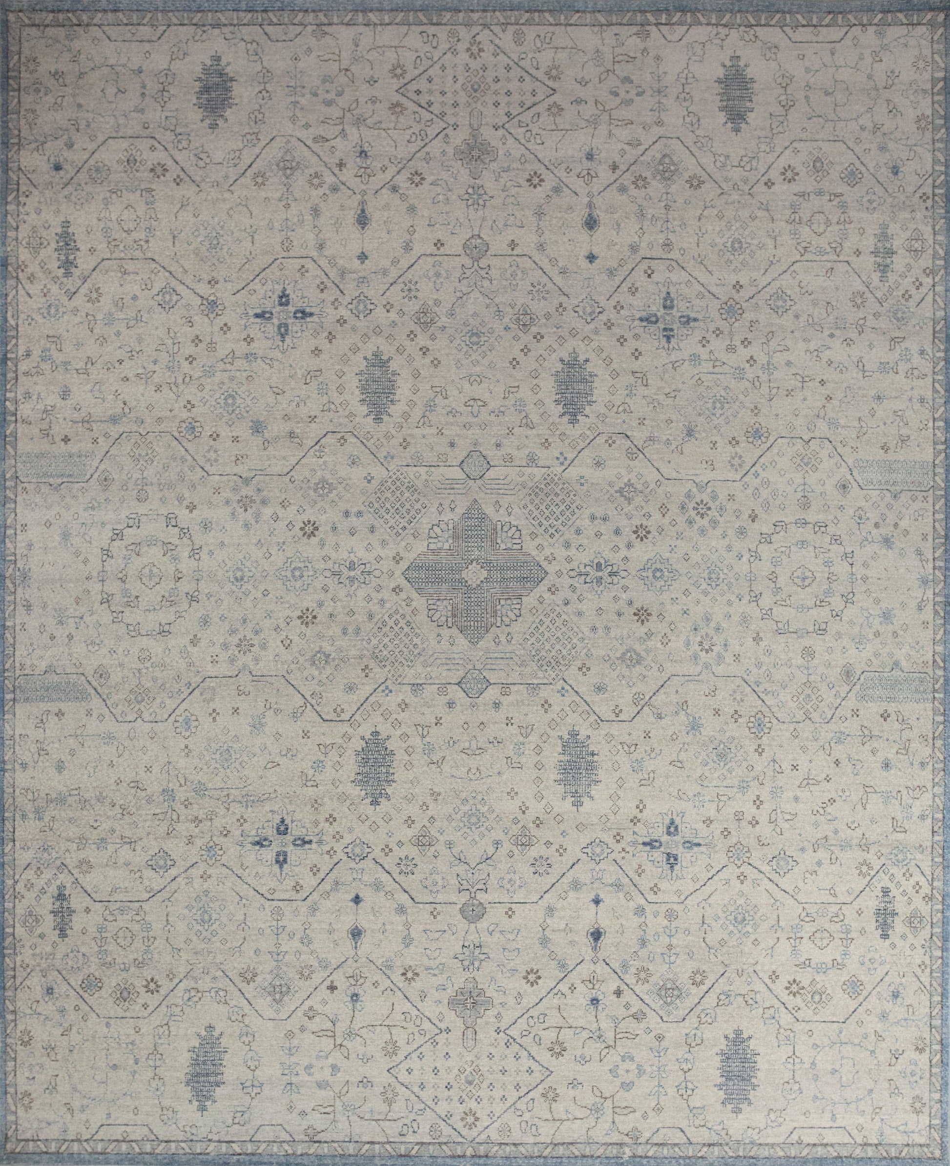 Flawless carpet comes with a relaxing color theme which has light blue, beige background, and brown details. 