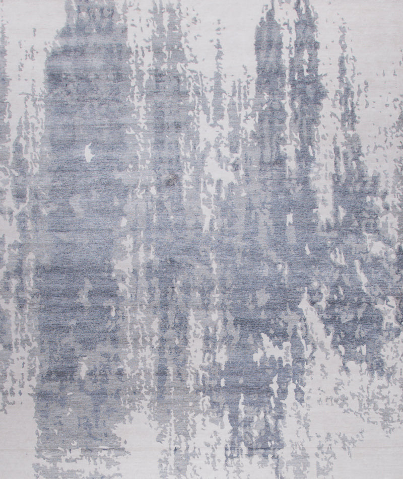Modern rug with white background and a vertical distressed light blue design.