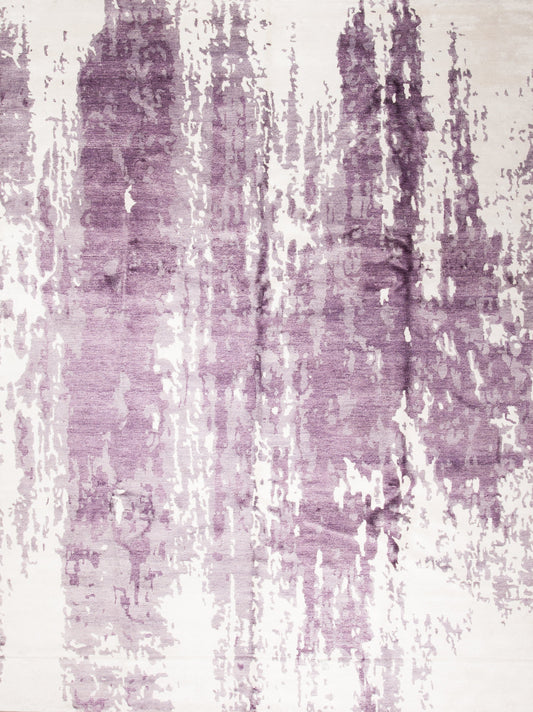 Stylish rug with white background and purple distressed design.