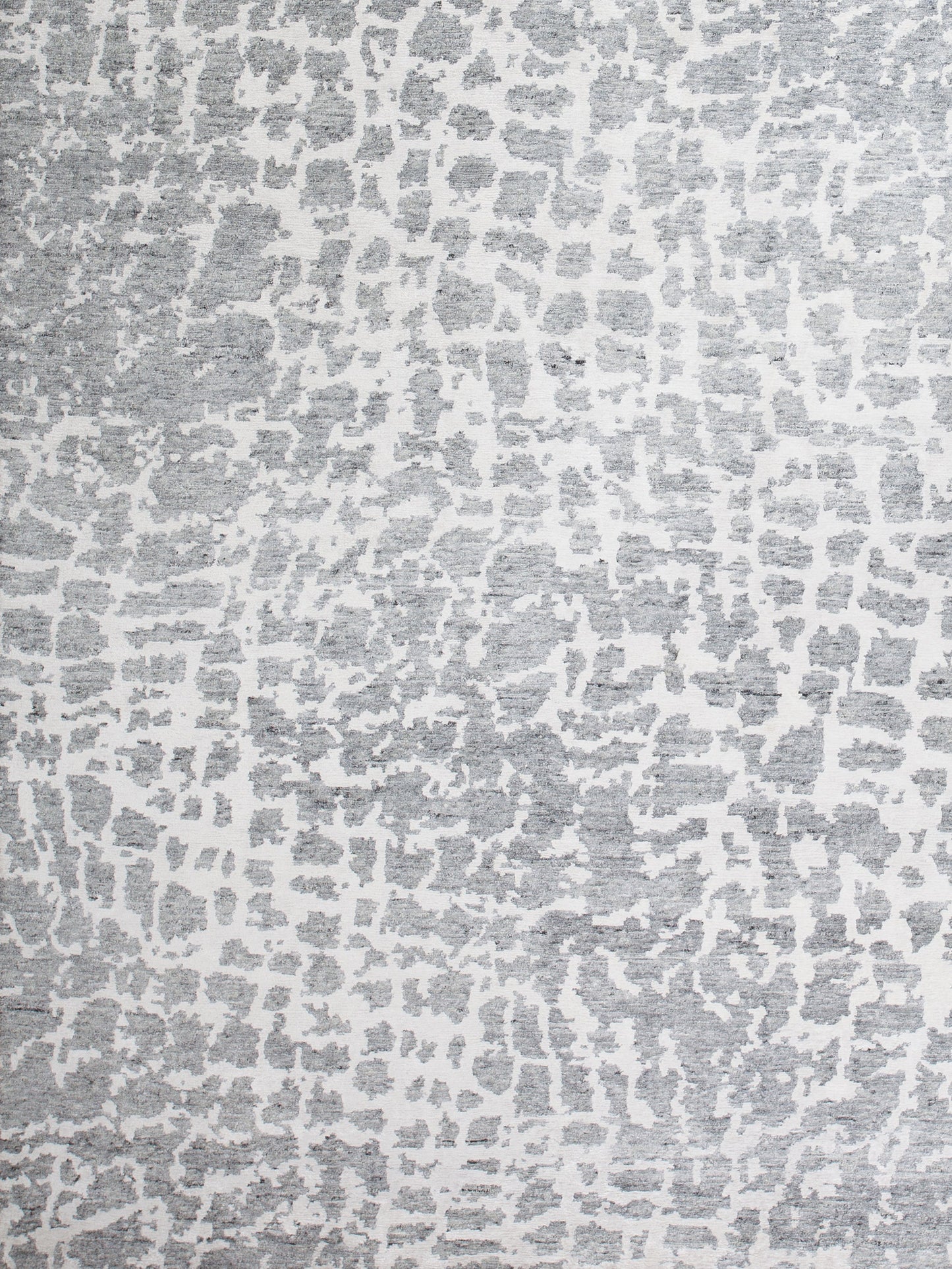 The center's close-up displays the comfy texture of this contemporary rug.