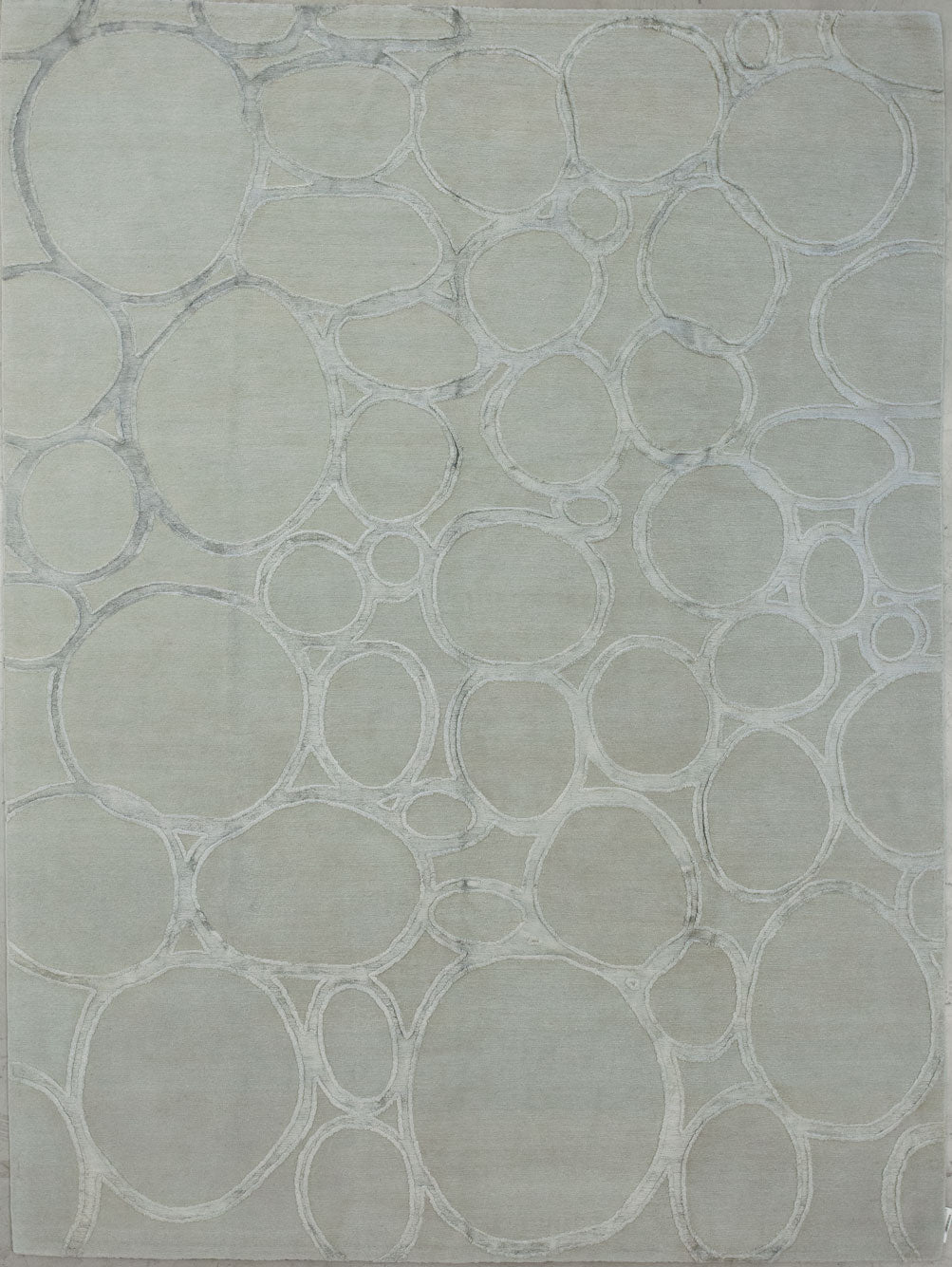 Contemporary rug comes with a bubble design.
