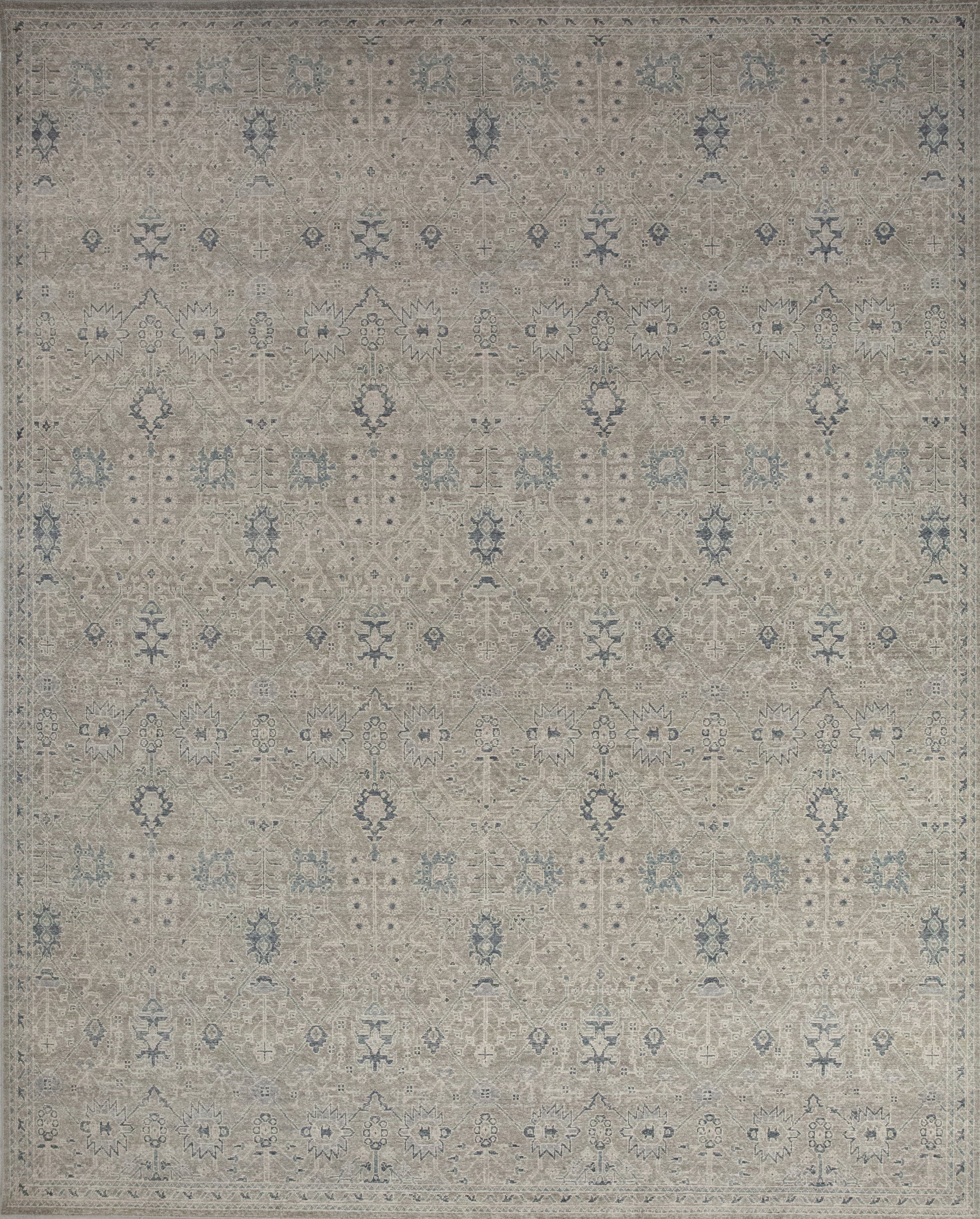Vintage rug comes with a tranquil color scheme which has variations of beige and gray accents.